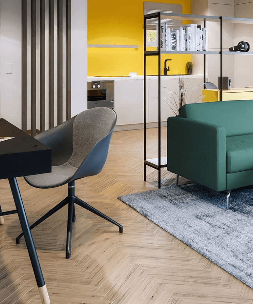 Mikroapartment mit direktem Wohn- und Küchenbereich und modern eingerichteten Möbeln