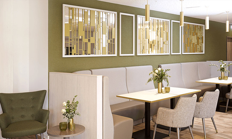 Moderne Möbel und grüne Wandfarben für den Essbereich eines Restaurants
